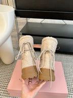 SNOW ANKLE BOOTS IN COSMIC LATTE SHEARLING