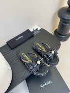PLATFORM FLIP-FLOPS IN BLACK TWEED FABRIC