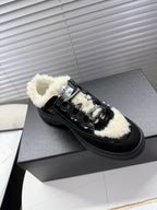 CHANEL 25S SNEAKERS WITH FUR ACCENTS 35MM IN BLACK CALFSKIN