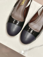 SLINGBACKS IN BLACK SHEEPSKIN