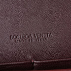 BOTTEGA VENETA 25S ANDIAMO POUCH 19 IN DEEP MAROON CALFSKIN GOLD HARDWARE