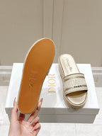 DWAY WEDGE SLIDES 45MM IN WARM GREIGE FABRIC RAFFIA SOLE