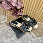 PLATFORM SLIPPERS WITH FLOWER IN BLACK LAMBSKIN