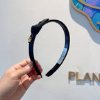 BOW HAIRBAND IN BLACK RE-NYLON 356589