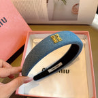 THICK HEADBAND IN AZURE BLUE DENIM GOLD LOGO 425464