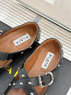 CROSSED STRAP BALLET FLATS IN BLACK CALFSKIN