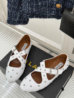 CROSSED STRAP BALLET FLATS IN WHITE CALFSKIN