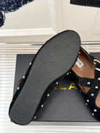 CROSSED STRAP BALLET FLATS IN BLACK SUEDE