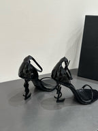 YSL HEELED SANDALS 25S 105 MM IN BLACK GLOSSY LAMBSKIN