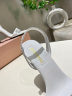 TWO STRAP HIGH HEELED SANDALS IN WHITE GLOSSY SHEEPSKIN