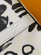 LVx N&PW Keepall Bandoulière 50 Black White Cowhide