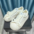 THICK-SOLED SHOES IN WHITE WOVEN WOOL