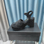 THICK-SOLED WEDGE SANDALS IN BLACK SUEDE