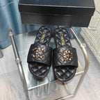 QUILTED SLIPPERS BLACK SHEEPSKIN