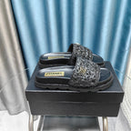 KNIT SLIPPERS IN BLACK WOVEN SATIN AND SHEEPSKIN
