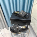 KNIT SLIPPERS IN BLACK WOVEN SATIN AND SHEEPSKIN