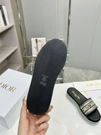 CD DWAY PLATFORM SLIDE IN BLACK AND WHITE COTTON STRIPED SOLE