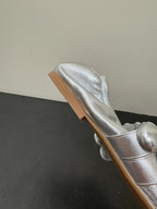 ALAIA SPHERE BALLET FLATS IN SILVER LAMBSKIN