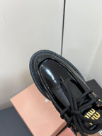 LACE-UP LOAFERS WITH THICK SOLE IN BLACK SHINY SHEEPSKIN