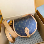 SADDLE BAG 18 IN BROWN MONOGRAM CANVAS AND LEATHER TRIM