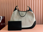 BODY MEDIUM SHOULDER BAD 49 IN NATURAL CANVAS AND BLACK CALFSKIN GOLD HARDWARE