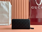 Gucci Zipper Wallet Black Embossed 248406