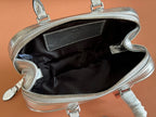 ARCADIE MATELASSÉ BAG 19 IN SILVER GLOSSY CALFSKIN GOLD HARDWARE