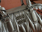 ARCADIE MATELASSÉ BAG 19 IN SILVER GLOSSY CALFSKIN GOLD HARDWARE