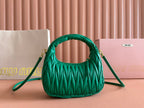 WANDER MATELASSÉ HANDBAG 23 IN PINE GREEN LAMBSKIN