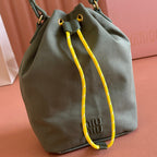GABADINE POUCH 22.5 IN OLIVE GREEN CANVAS YELLOW DRAWSTRING