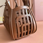 WOVEN HOLLOW BAG 24 IN DARK BROWN CALFSKIN