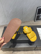 ALAIA CHUNKY TWO-STRAP SLIDES 25S IN YELLOW CALFSKIN