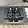 ALAIA DOUBLE-STRAP SANDALS 25S IN BLACK CALFSKIN