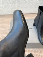 ANKLE BOOTS IN BLACK LOGO EMBOSSED SOFT SHEEPSKIN