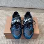 GYMNASIUM SNEAKER IN BLACK FABRIC AND BLUE SNAKE EFFECT CALFSKIN