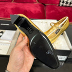 HIGH MARY JANE IN GOLDEN CALFSKIN AND BLACK SATIN