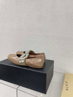 ALAIA MARY JANE PEARL IN GLOSSY BEIGE LAMBSKIN