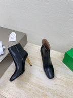 KNOT ANKLE BOOT IN BLACK CALFSKIN WITH GOLD METAL HEEL 9 CM