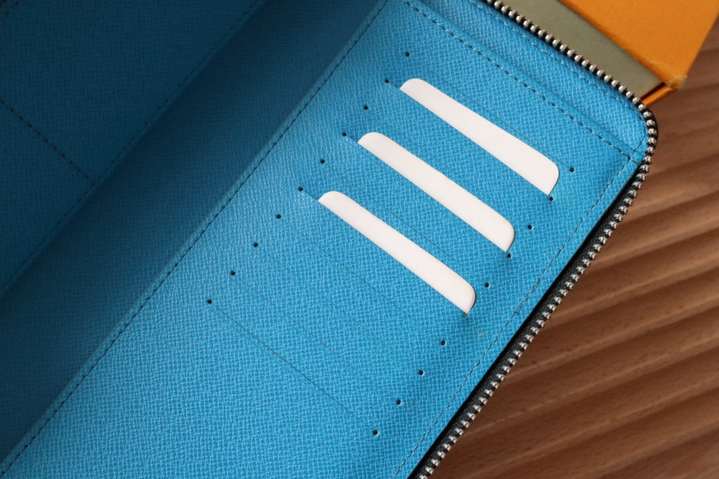 LV Zippy Vertical Wallet Light Blue Monogram Canvas & Taïga Leather 180051