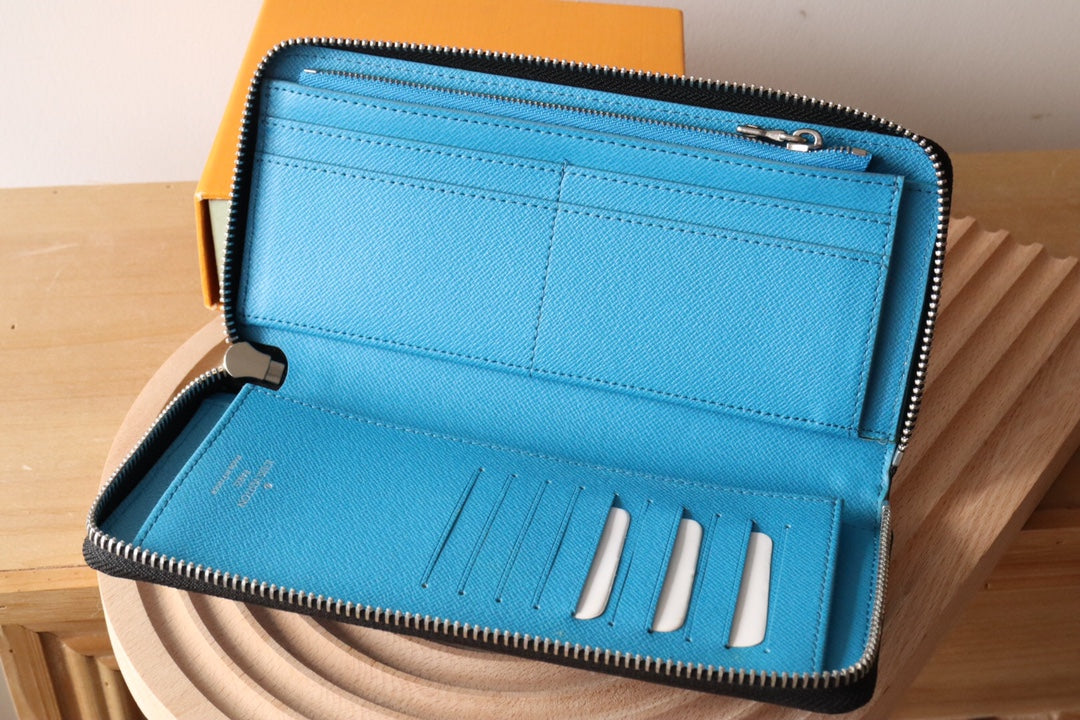 LV Zippy Vertical Wallet Light Blue Monogram Canvas & Taïga Leather 180051