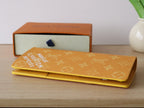 LV Brazza Wallet Yellow Monogram Heritage Canvas 224172