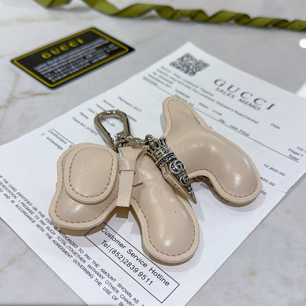 Gucci Beige Dog Charm