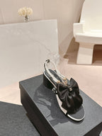 HIGH SANDAL WITH PEARL CHAIN BLACK LAMBSKIN WITH WHITE RHINESTONES