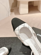 SLINGBACKS IN WHITE LAMBSKIN AND BLACK SATIN