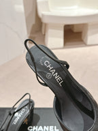 HIGH SLINGBACKS IN BLACK LAMBSKIN AND SATIN