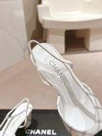 HIGH SLINGBACKS IN WHITE LAMBSKIN AND BLACK SATIN