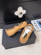 FLAT MARY JANE PUMPS IN DIJON YELLOW LAMBSKIN MIX BLACK FABRIC
