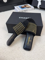 FLAT SLIDE IN BLACK SUEDE WITH GOLD CRYSTALS