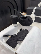 HIGH 12 CM PLATFORM SANDALS IN BLACK SUEDE