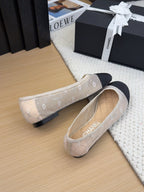 BALLET FLAT IN BLACK FABRIC AND WHITE MESH